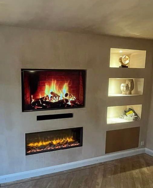 Living room wall with inset media wall set up installed by CN Plumbing and Heating